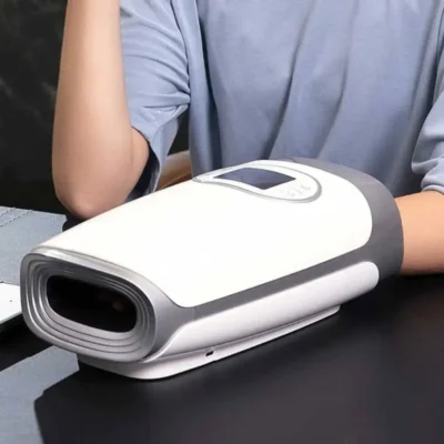 Close-up photo of a male model enjoying the Hand Massager by Reposepoint