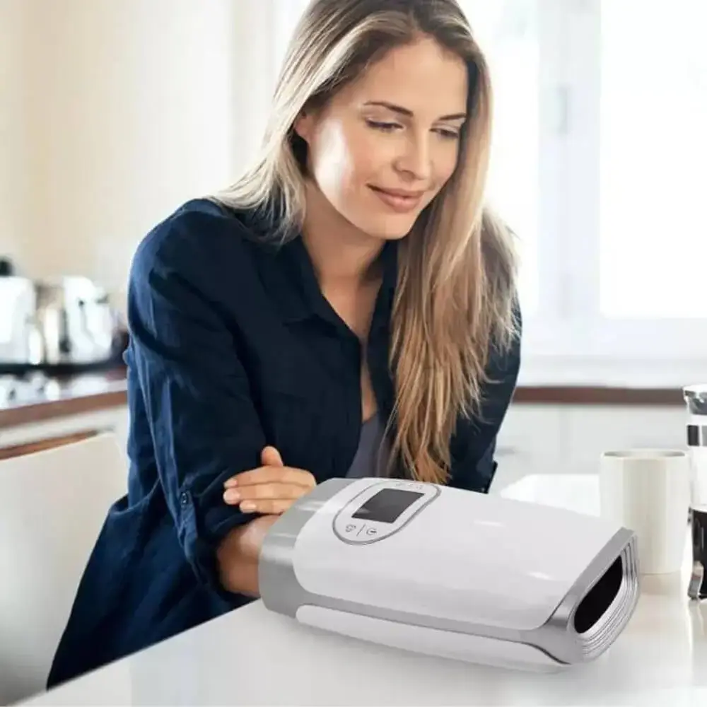 Woman using the Hand Wrist Massager to relief hand pain and relax.