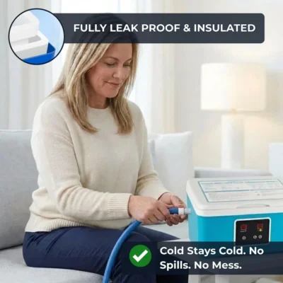 Woman connecting cold therapy tube to teal machine — fully leak proof and insulated cold therapy system for knee recovery